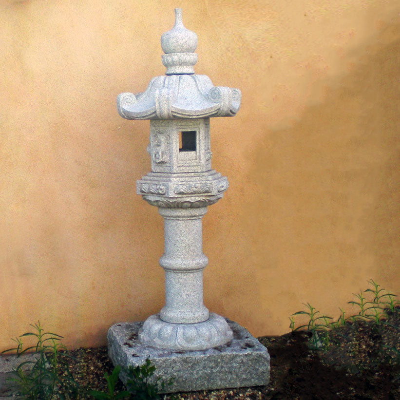 Stone Forest Kasuga-style lantern. This traditional Japanese Lantern is of the Tachi-gata-style or pedestal stone lanterns. Carved from black & white (salt & pepper) granite. 68"h