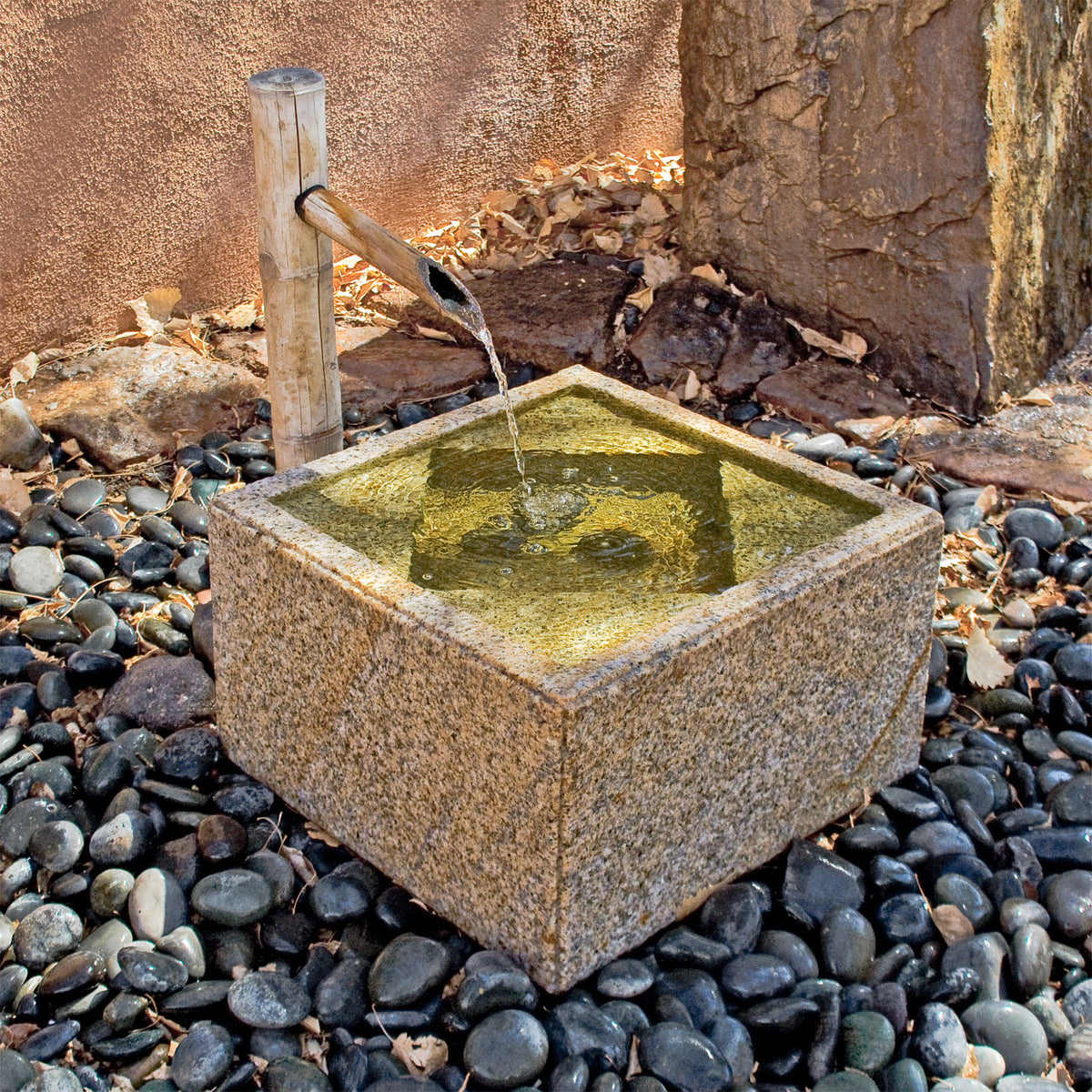 Hand carved beige granite Portland Basin used as garden fountain image 2 of 3